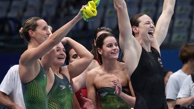 Claudia Dean, 16, of Australia reacts when she won the Gold Medal