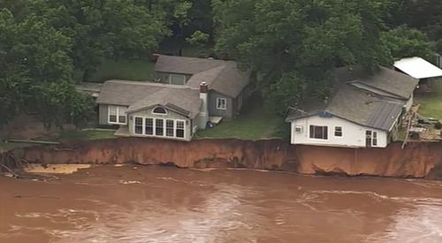 Waterlogged parts of the central US were bracing for more rain, following days of severe storms that have battered Iowa, Kansas, Missouri and Oklahoma.  (KOCO-5 via AP)