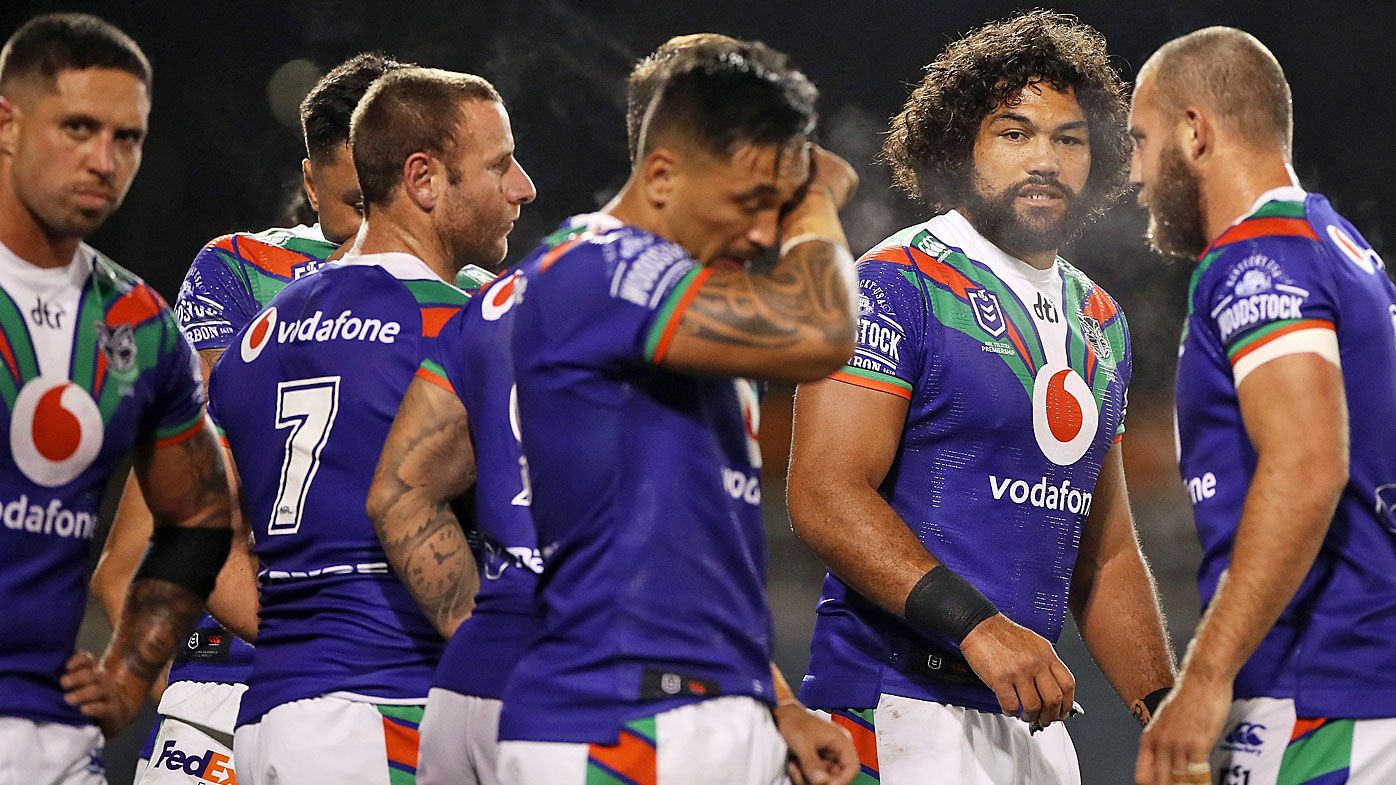 The Warriors look dejected after a Panthers try 