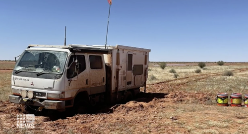 The family's camper remains stuck in the mud, over 1000 kilometres away.