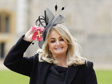 Gaynor Sullivan, (Bonnie Tyler), with her MBE after being made a Member of the Order of the British Empire by the Prince of Wales during an investiture ceremony at Windsor Castle on February 1, 2023 in Windsor, England.