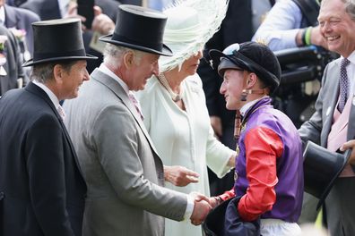 King Charles III congratulates the winner, Tom Marquand on Desert Hero, on day three of Royal Ascot 2023 at Ascot Racecourse on June 22, 2023 in Ascot, England 