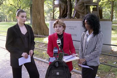 Flanked by Veronika Didusenko, left, and Danielle Hazel, right, attorney Gloria Allred, center, speaks during a news conference Monday