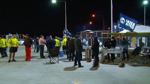 Sacked workers protested through the night. (9NEWS)