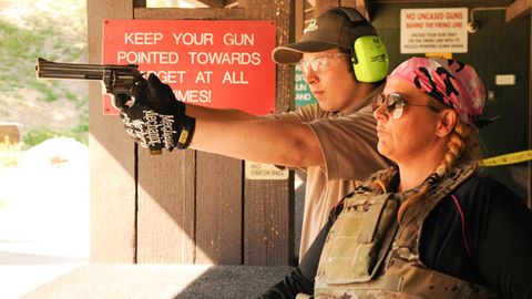 In pics: Ajay Rochester takes 14-year-old son to gun range after death threats