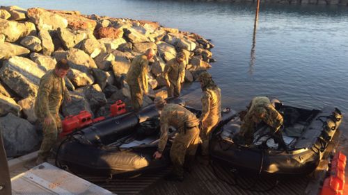 WA army crew searched for Mr Bale using Zodiac boats this morning. (9NEWS)