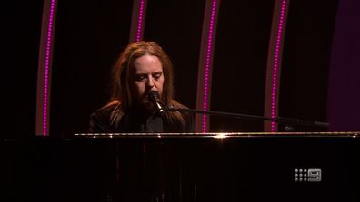Tim Minchin performs during the In Memoriam segment of the 2022 Logies.