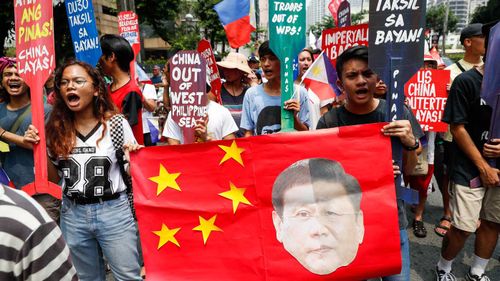 Protesters rally against Xi Jinping in the Philippines.