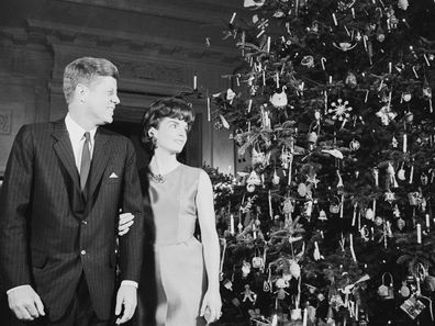 John F. and Jackie Kennedy with their 1962 White House Christmas tree.