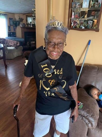 Woman marks 100th birthday with drive-thru party