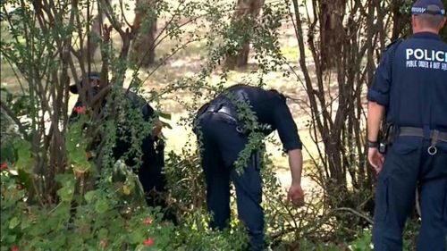 Police are searching nearby scrub as they investigate the discovery. (9NEWS)