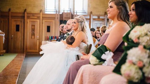 Bride mum becomes viral star for stopping wedding to breastfeed