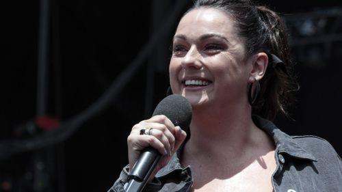  Comedian Celeste Barber addresses the crowd during Fire Fight Australia at ANZ Stadium on February 16, 2020 in Sydney, Australia. (Photo by Cole Bennetts/Getty Images)