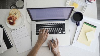 Woman typing on computer