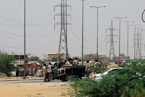 Army soldiers deploy in Khartoum on April 15, 2023, amid reported clashes in the city. 