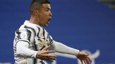 Juventus' Cristiano Ronaldo celebrates scoring his team's opening goal during the Italian Super Cup final.