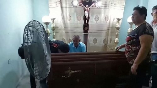 A woman who was pronounced dead in Ecuador woke up in her coffin.