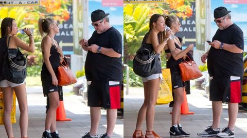 Pic exclusive! Fuller-figured Kyle Sandilands in Fiji with girlfriend ... staying at $8220 a night resort