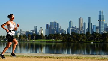 A jogger in Albert Park, Melbourne.