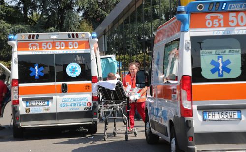 Paramedics treat the injured. Picture: AAP