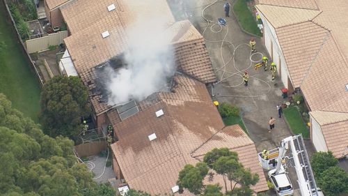 A woman has been killed in a fire at a home in Northmead.