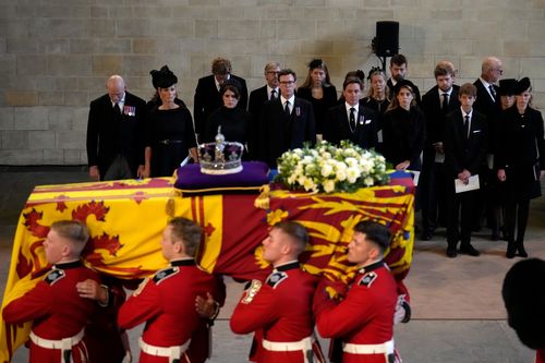 Mike Tindall, Zara Tindall, Princess Eugenie, Princess Beatrice, Edoardo Mapelli Mozzi, Lady Helen Taylor, Princess Beatrice, James, Viscount Severn and Lady Louise Windsor pay their respects as the coffin of Queen Elizabeth II is carried into The Palace of Westminster during the procession for the Lying-in State of Queen Elizabeth II on September 14, 2022 in London, England. Queen Elizabeth II's coffin is taken in procession on a Gun Carriage of The King's Troop 