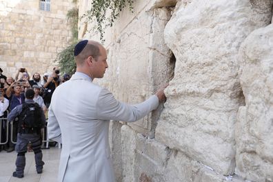 Prince William touches the Western Wall in the Old City of Jerusalem, 28 June 2018. 