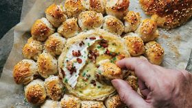 Cocktail sausages with baked cheese dip