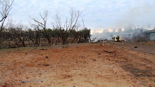 The scene after the truck rollover and inferno. (QPS Media)