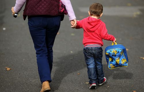 Many south-east Queensland parents have been told to pick their children up early. (AAP) 