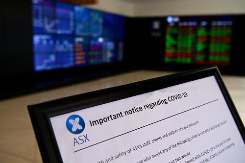 A COVID-19 notice at the Australian Stock Exchange (ASX) in Sydney, Thursday, April 16, 2020. (AAP Image/Joel Carrett) NO ARCHIVING