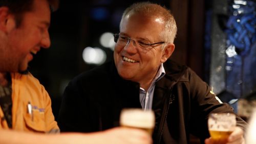 Prime Minister Scott Morrison meets locals at Molly Malone's Irish Pub in Devonport, Tasmania on Wednesday.