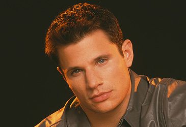 What is the name of Nick Lachey's boy band?