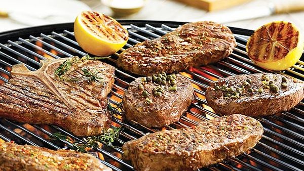 The Honey Badger's barbecued T-bone steaks with herbs and green peppercorns