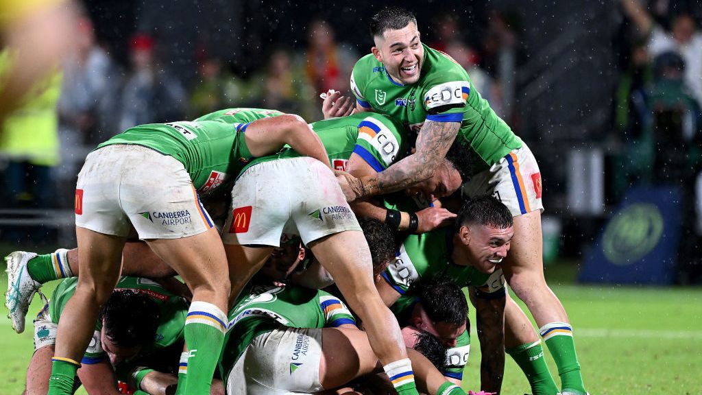Jordan Rapana of the Raiders celebrates victory with his team mates after kicking the winning field goal in golden point extra time during the round 13 NRL match between Dolphins and Canberra Raiders at Suncorp Stadium, on June 01, 2024, in Brisbane, Australia. (Photo by Bradley Kanaris/Getty Images)