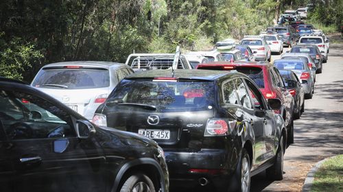 Cars at the pop up Covid Testing Centre at Frenchs Forest Aquatic Centre Drive in Sydney..