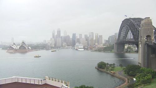 Heavy rainfall hammers Sydney marking end of hottest summer on record