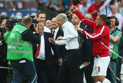 The soaking started moments after the final whistle, thanks to Lukas Podolski.