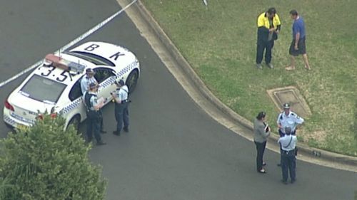The woman's body was found inside a home on Links Avenue, Milperra. (9NEWS)