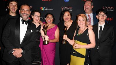 Deborah Mailman poses with the cast and crew of Total Control with the the AACTA Awards for Best Lead Actress and Best Drama Series in the media room during 2019 AACTA Awards Presented by Foxtel at The Star on December 04, 2019 