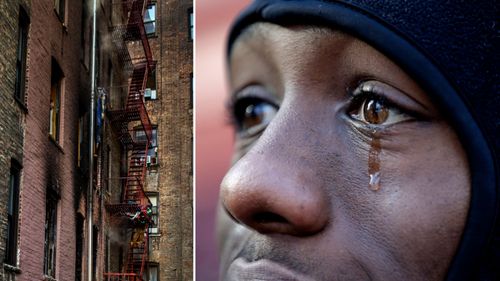 A tear runs down the face of Kenyon George, 19, whose girlfriend Shawntay Young, 19, died during the apartment building fire.