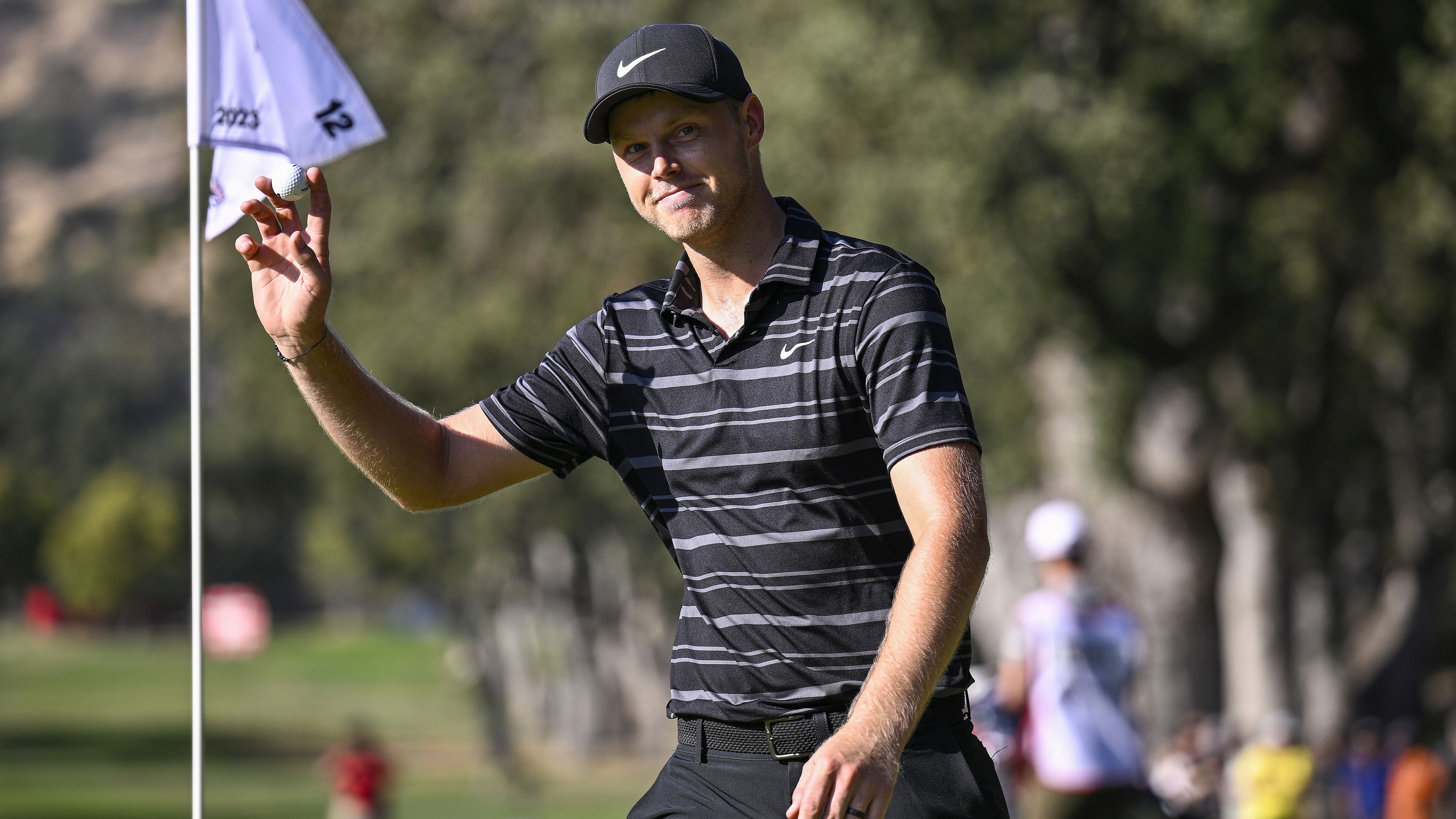 Cameron Davis of Australia waves after holing out on the 12th hole during the final round of the Fortinet Championship.