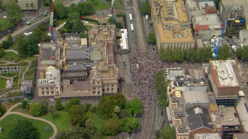 Over 1,000 protesters have marched down Bourke St towards Melbourne's Parliament House against the state's vaccine mandates and a proposed COVID-19 pandemic bill