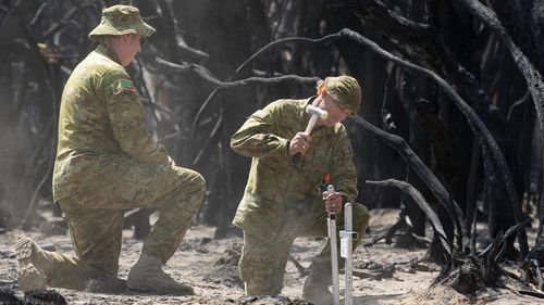 "A mixture of pride and sadness": Lt Lang has vowed to continue the work of his loved ones.