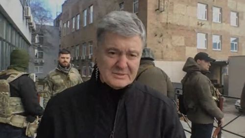 Former Ukrainian President Petro Poroshenko has joined civilians on the streets of Kyiv as Russian forces closed in on the city on Saturday.