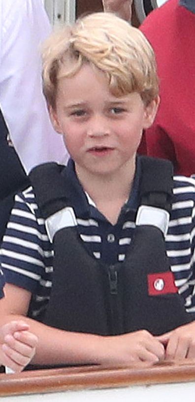 Michael Middleton and Prince George watch the inaugural King's Cup regatta hosted by the Duke and Duchess of Cambridge on August 08, 2019 in Cowes, England. 