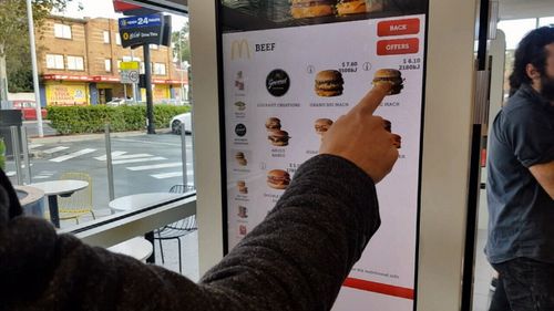 McDonalds is urging customers to use its self-serve menu to order.