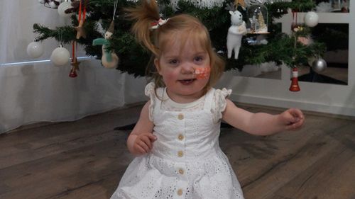 Millie Robinson, two, was born with a serious heart condition which means she has 'half a heart' and multiple other related problems.