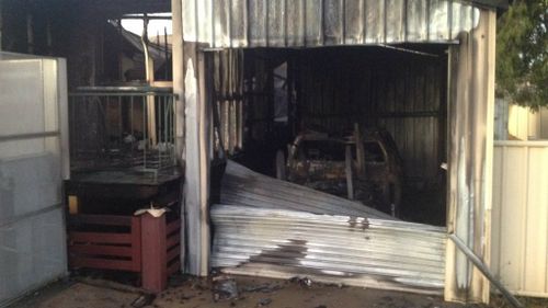 The burnt out wreckage of a police car. (Queensland Police)