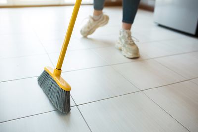 Sweep the kitchen floor